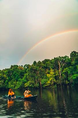 j in canoe with rainbow.jpg